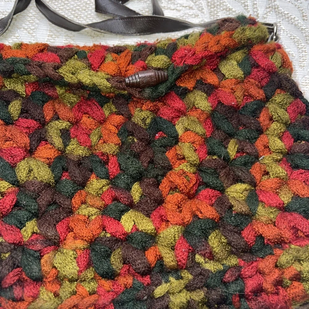 crossbody bag made with funky chunky, variegated yarn toggle closure